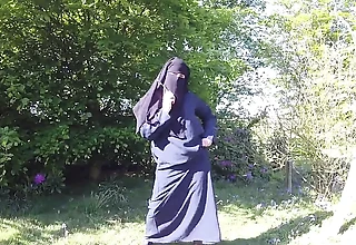 Muslim alongside burqa and stockings – flashing outdoors
